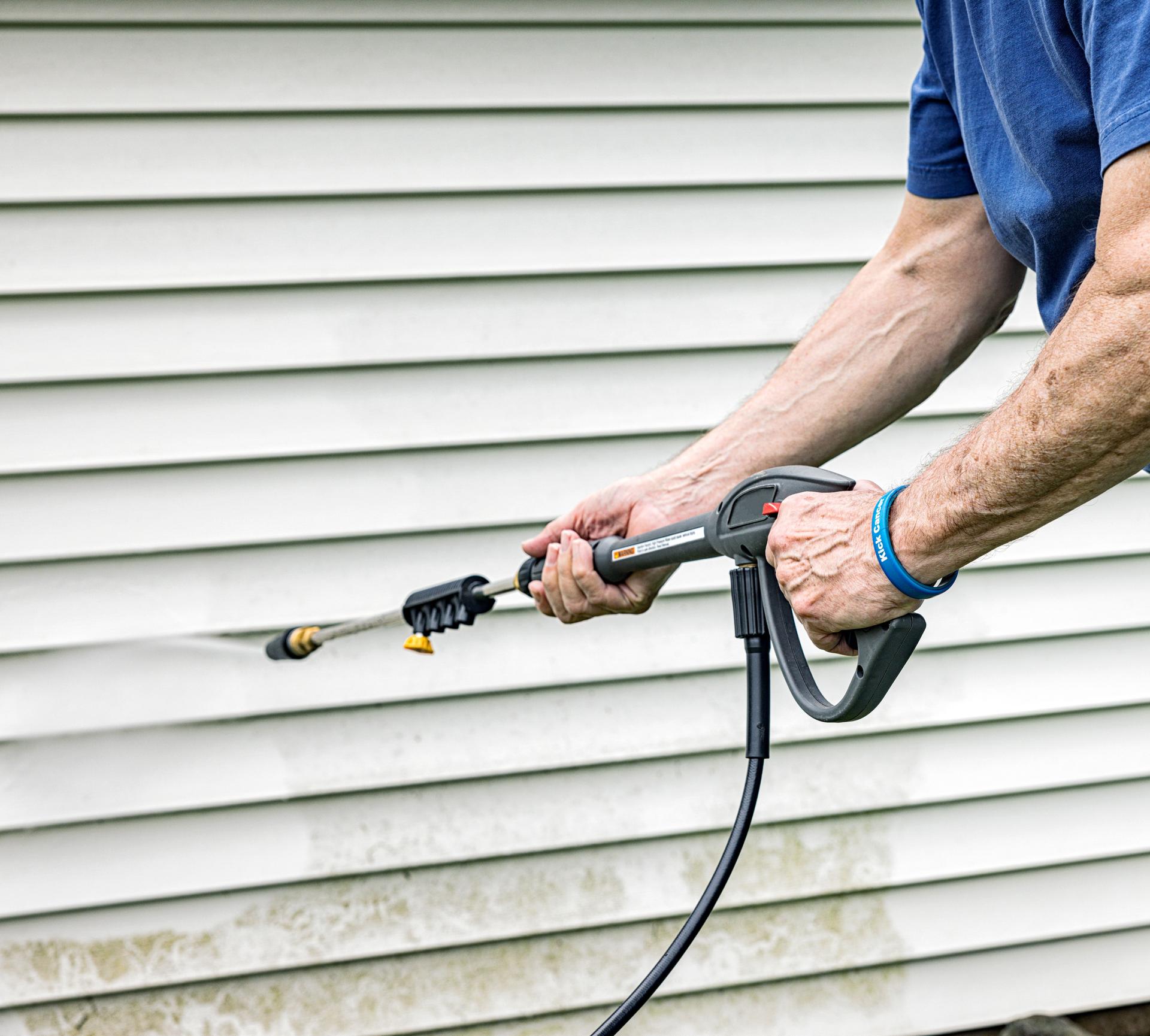 Senior Man Cancer Survivor DIY Power Washing Siding